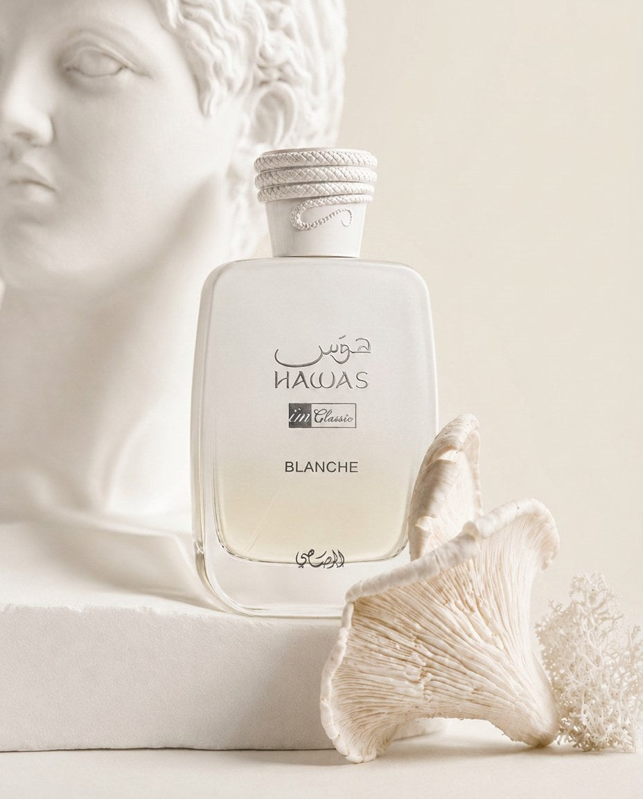Hawas Blanche beside a plaster bust and white coral